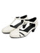 White shoes with black accents on a white background