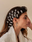 Barrette cheveux argentée forme d’étoile ornée strass