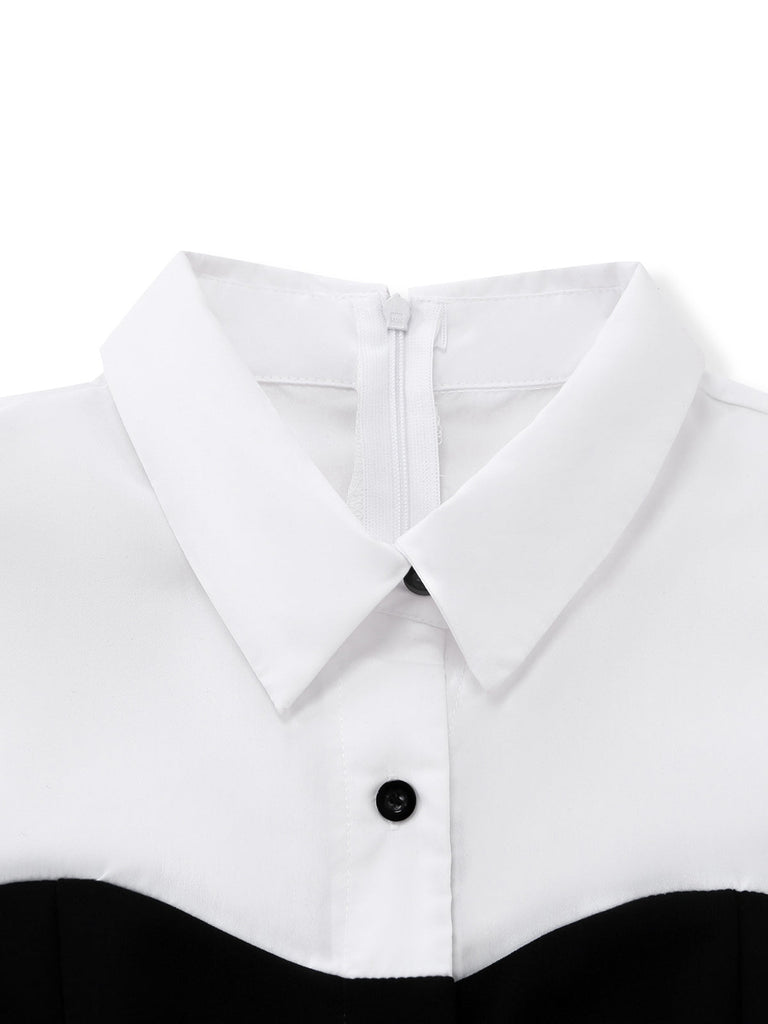 Close-up of a white shirt collar with a black button on a white background