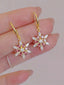 Boucles d’Oreilles Pendantes Dorées Flocon de Neige pour Noël