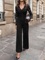 Combinaison noire en dentelle à col V manches longues et jambes larges Années 1950