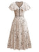 Robe à pois irréguliers à volants et col en V années 1940