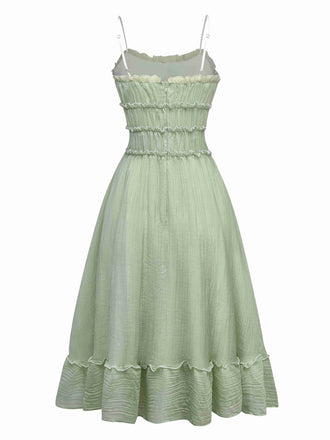 Robe verte à bretelles spaghetti et nœud papillon années 1940