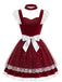 Ensemble robe de Noël rouge en velours à tablier, nœud et bordure en résille années 1940 - 2