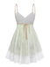 Light green nightdress with white lace trim on a white background