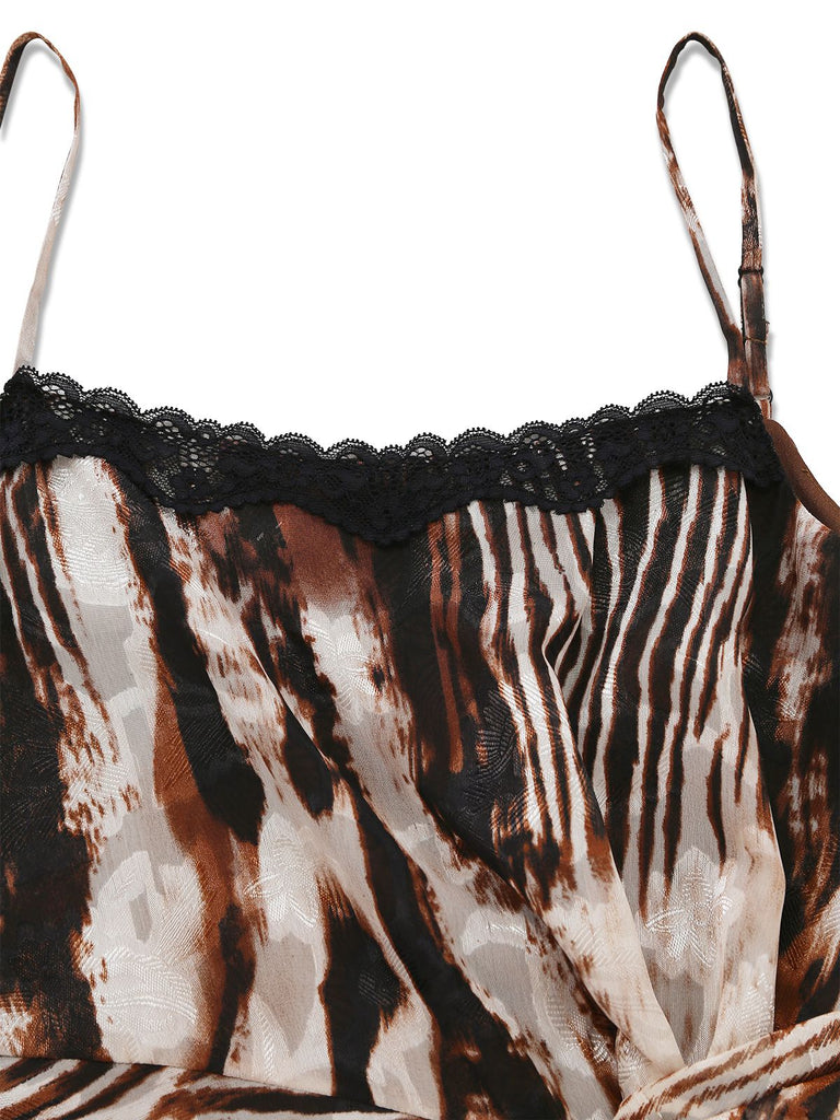 Close-up of the delicate black lace trim along the square neckline of the animal print dress.