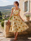 Robe orange motif tournesols et encolure cœur années 50