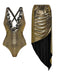 Front view of the metallic gold swimsuit paired with a matching draped sarong featuring black fringe detail.