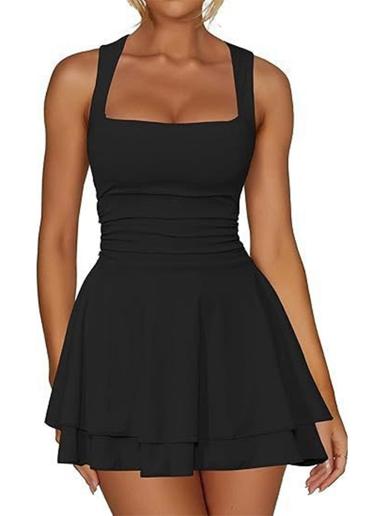 Front view of a model wearing the black sleeveless tiered mini dress, highlighting the fitted bodice and square neck.