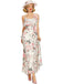 A model wearing the pink floral ruffle maxi dress paired with a matching wide-brimmed floral hat.