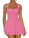 Front view of a model wearing the pink tiered mini dress, highlighting the feminine flared skirt.