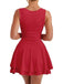 Rear view of a model wearing the red tiered mini dress, highlighting the clean sleeveless lines.