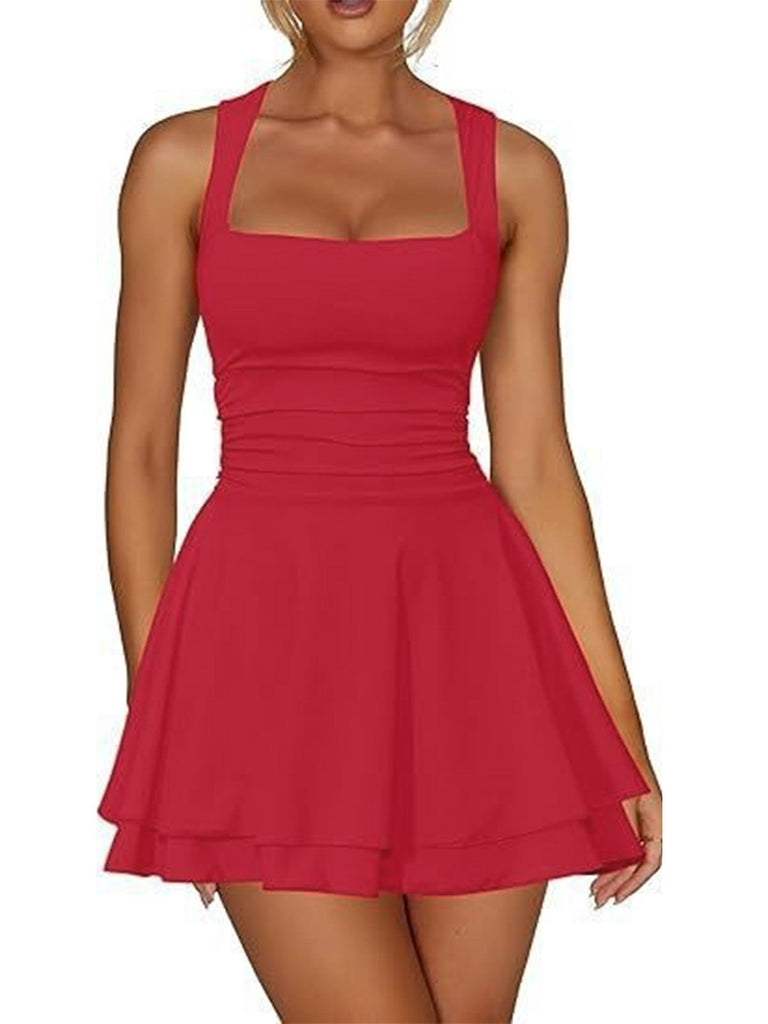 Front view of a model wearing the red sleeveless tiered mini dress, demonstrating the flared skirt silhouette.