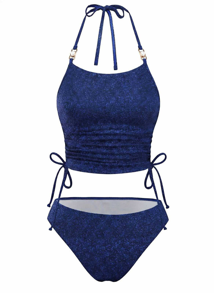 Front view of the navy blue glitter tankini set showcasing the adjustable halter straps and ruched bodice.