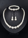 Parure 3 pièces collier, bracelet et boucles d’oreilles pendantes à perles blanches - 1