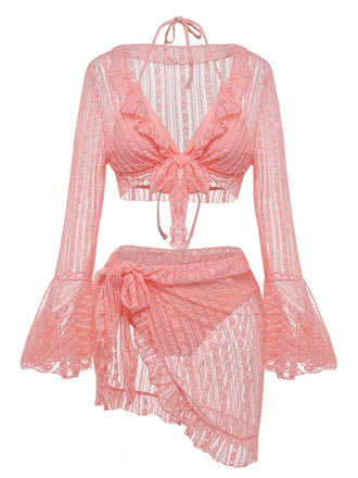 Front view of the pink lace swim set showing the tie-front bell-sleeve cardigan and sarong-style skirt.