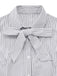 Close-up of the collar and the neatly tied pinstripe fabric bow.