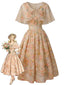 [Prévente] Robe-cape ceinturée motif floral années 1950