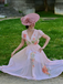 Robe rose col V manches volants imprimé floral années 1940