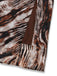 Close-up of the side slit hemline and high-quality edge stitching of the animal print midi dress.