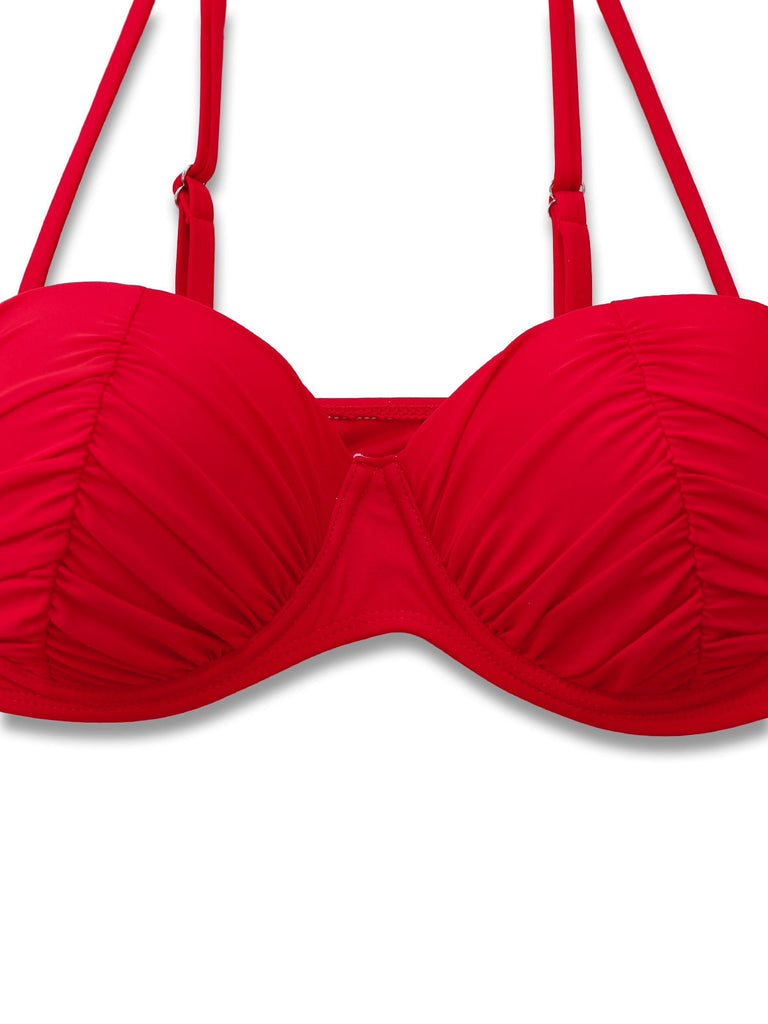 Red bikini top on a white background