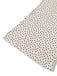 Fabric with polka dots on a white background