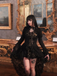 [Prévente] Robe victorienne noire en dentelle à manches gigot des années 1980