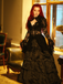 [Prévente] Robe victorienne noire en dentelle à manches gigot des années 1980