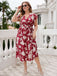 Robe rouge grande taille  florale et col en V à ceinture des années 1950