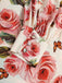 Robe à manches bouffantes à col en V et roses des années 1950