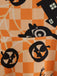 Robe à carreaux orange citrouille d'Halloween des années 1950