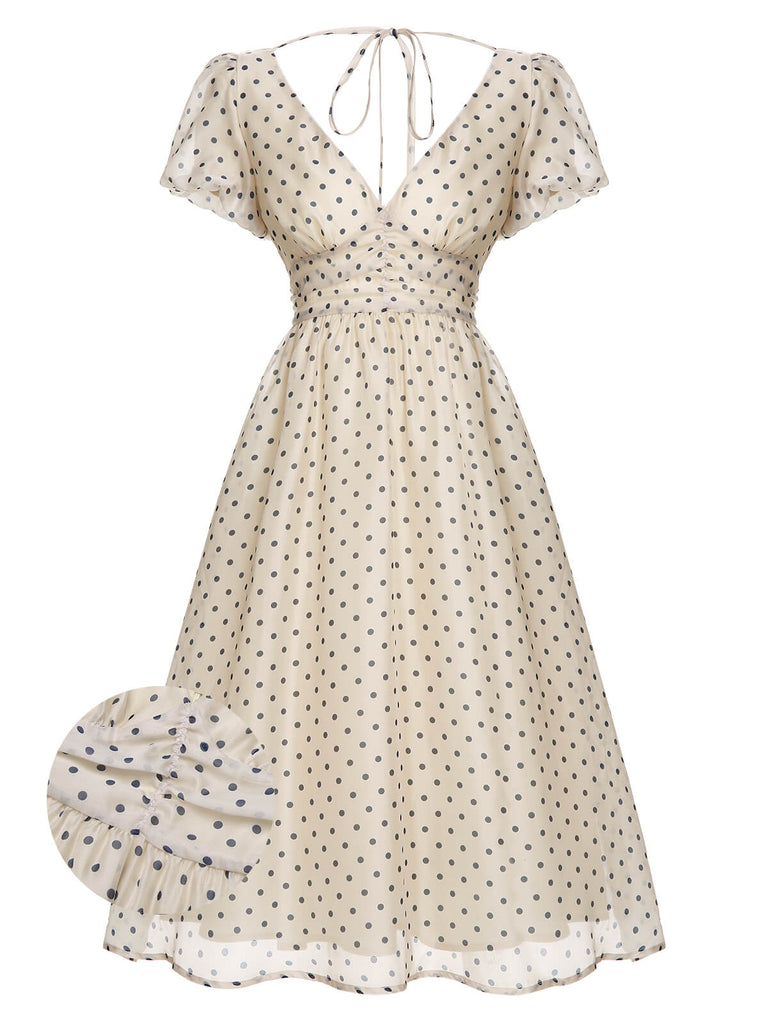 Robe à col en V beige à pois des années 1950