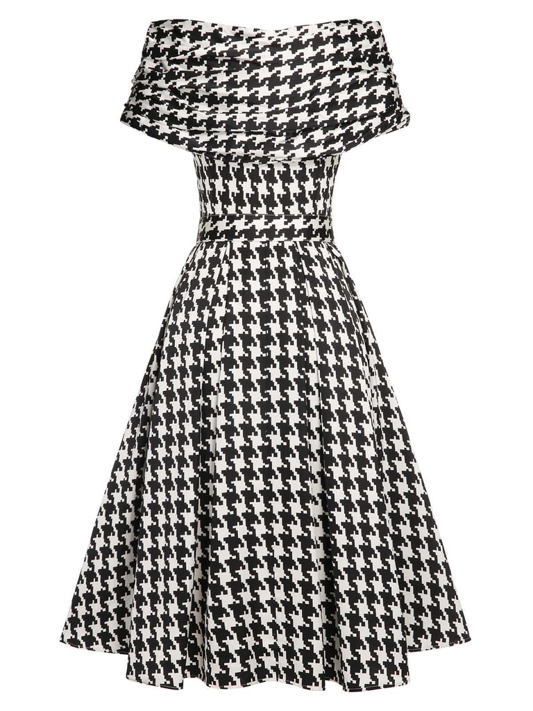 Robe noire ceinturée à manches courtes et pied-de-poule des années 1950