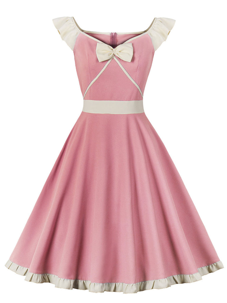 Robe trapèze rose années 50 avec col en cœur et nœud