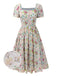 Robe bleue à fleurs et col carré des années 1950