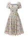 Robe bleue à fleurs et col carré des années 1950