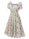 Robe bleue à fleurs et col carré des années 1950