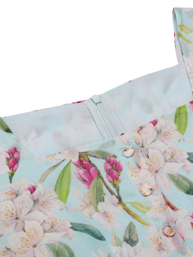 Robe bleue à fleurs et col carré des années 1950