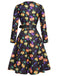 Robe noire à col en V et citrouilles d'Halloween