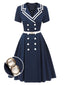 Robe à double boutonnage style marin bleu foncé des années 1950