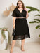 Robe noire  grande taille col en V et ceinture à paillettes des années 1950
