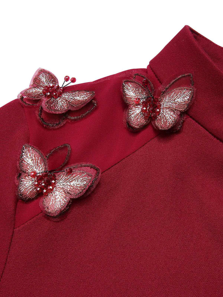 Blouse papillons à col montant rouge des années 1940