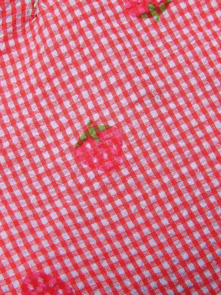 Combinaison dos nu rouge fraise des années 1950