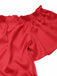 Robe rouge ceinturée à pois et épaules dénudées des années 1950