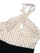 Combinaison dos nu beige et noire à pois coeur des années 1950