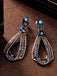 Boucles d'oreilles pendantes creuses en strass bleu