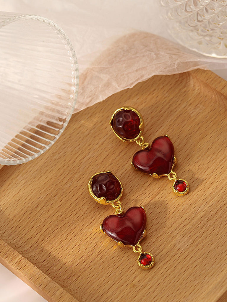 Boucles d’oreilles vintage en résine coeur bordeaux