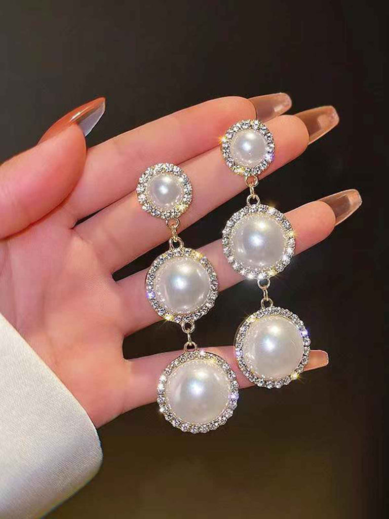 Boucles d'oreilles vintage en perles et diamants