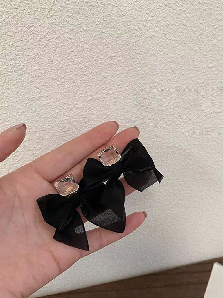 Boucles d'oreilles vintage en cristal transparent avec nœud