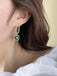 Boucles d'oreilles découpées géométriques vintage vertes